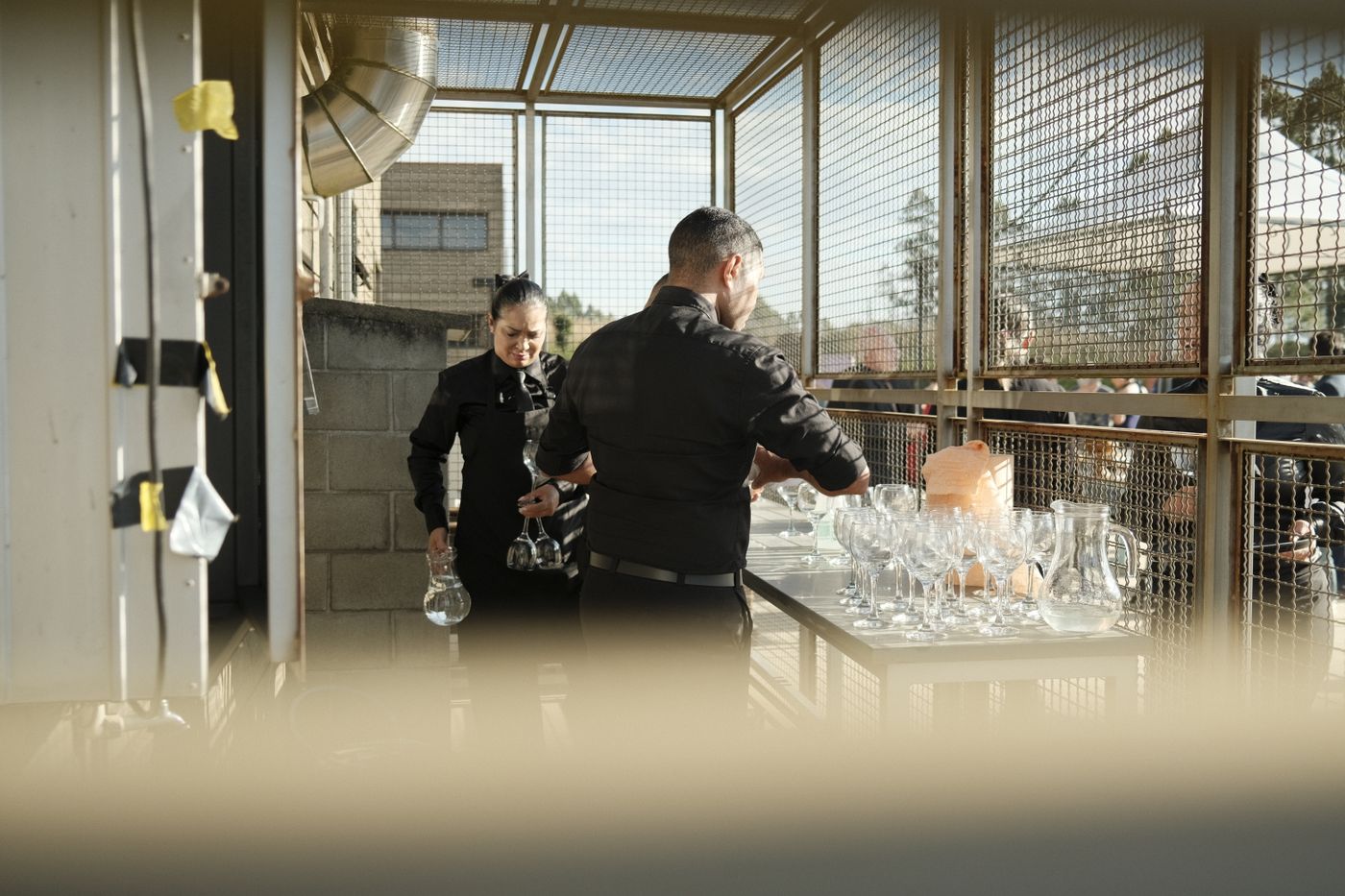 Event attendant supervising a party rental setup